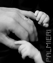 newborn holding dads fingers